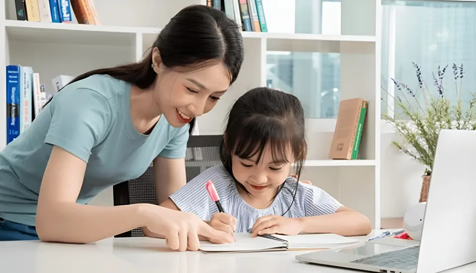 Experienced tutor helping a student study at home
